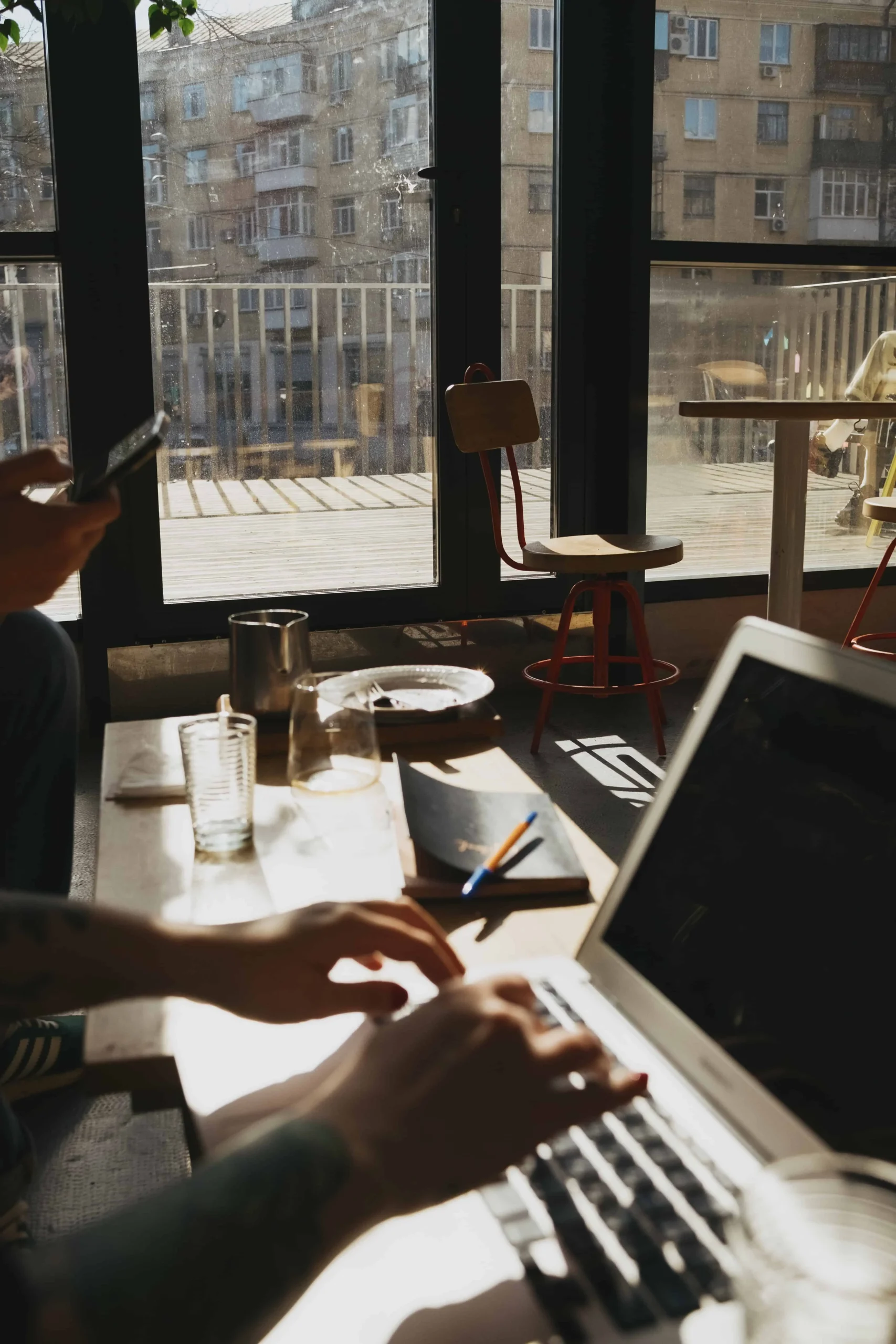 Working with a laptop in a cafe